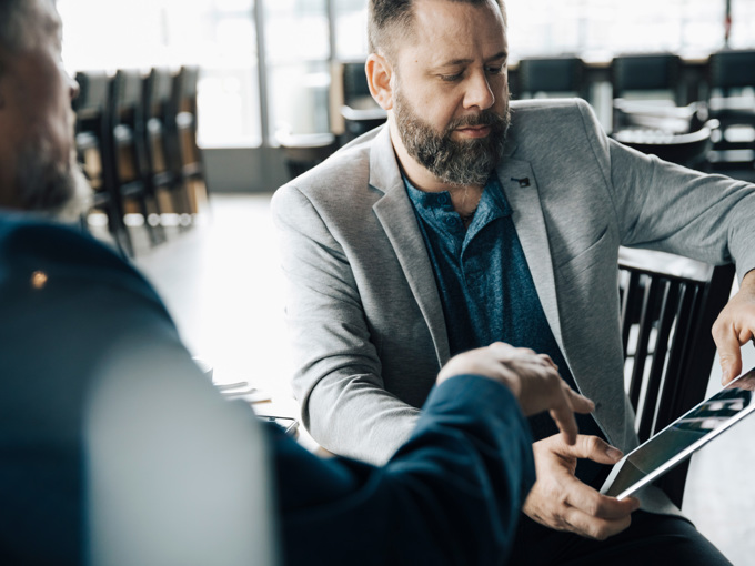 Businessmen Using Digital Tablet